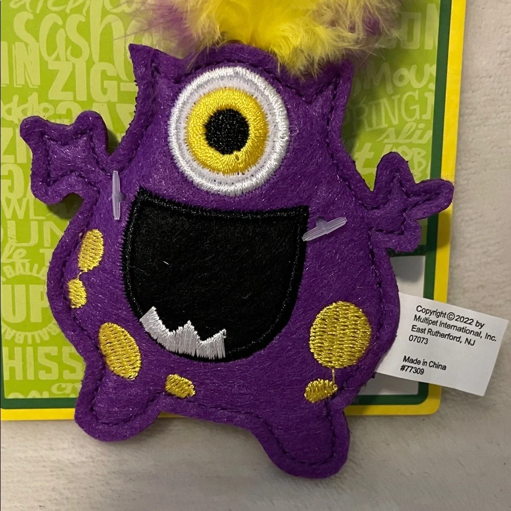 Multipet Purple Monster Cat Toy with Yellow Feathers